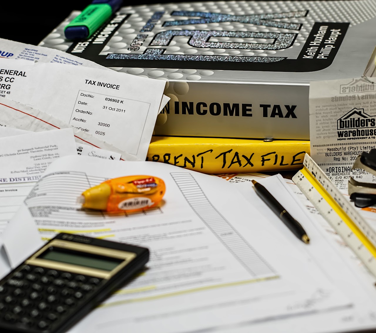 Tax files, invoices and receipts waiting to be sorted
